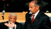 Jackson says no King holiday without Conyers