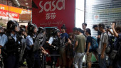 Hong Kong protests augur murky outlook for financial hub