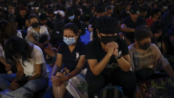 Hong Kong activist stabbed as protesters gird for march
