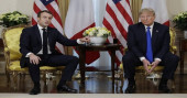 Trump barrels into NATO summit, clashes with France's Macron
