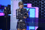 Taylor Swift wins big at AMAs and encourages fans to vote