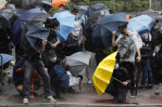 More than 20 charged with rioting appear in Hong Kong court