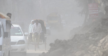 See in photos how Dhakaites battling with dust pollution