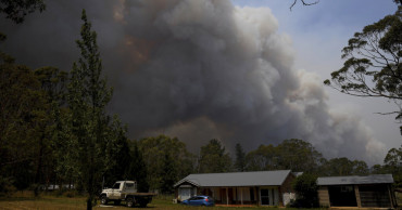 Australia battles 'catastrophic' wildfires as PM rushes home
