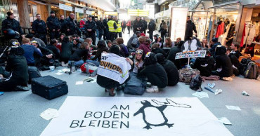 Climate protesters stage sit-in at Berlin's Tegel airport