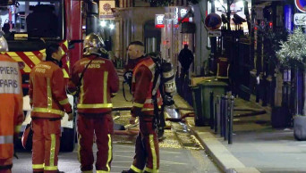 Paris apartment fire kills 8; police suspect arson