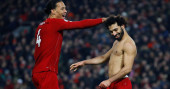 Liverpool beat Man Utd 2-0 to tighten grip on title