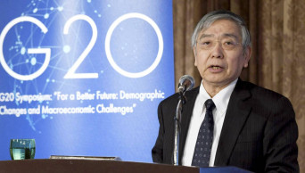 BOJ warns Japan faces new risks as population shrinks
