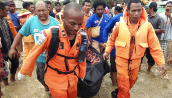 Flash floods, slides in eastern Indonesia kill at least 58
