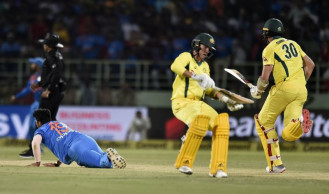 Australia wins on last ball in 1st ODI against India