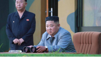NKorea fires 2 missiles into sea in likely protest of drills