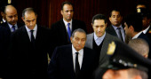 Egypt court acquits former president's sons of corruption