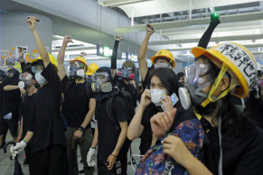 Hong Kong police in standoff with protesters after sit-in