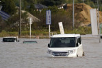 Floods, mudslides from heavy rain in Japan kill at least 10