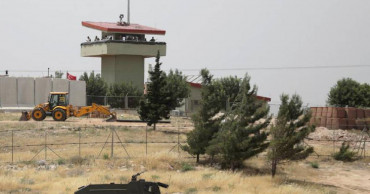 Turkey says it won't evacuate NW Syria observation posts