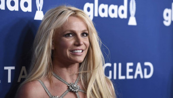 Britney Spears puts Vegas shows on hold due to dad's health