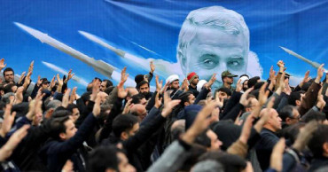 Soleimani's body arrives in Iran as Trump issues new threats
