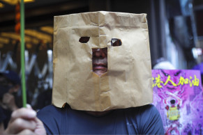 Thousands protest as bid to block Hong Kong mask ban fails