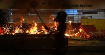 Police raise security around Hong Kong after night clashes
