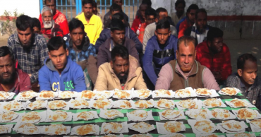 Jailors treat prisoners: Winter Pitha Festival at Meherpur Jail