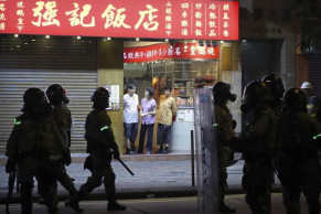 Riot police storm Hong Kong malls to nip more protests