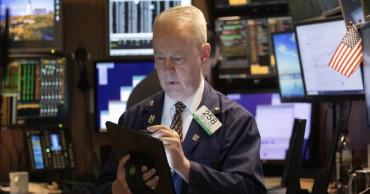 US stock indexes slip, but rush for safety slows