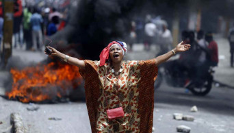 2 deaths as protesters burn tires, block roads in Haiti