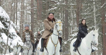 Kim again rides horse up mountain as nuke deadline nears
