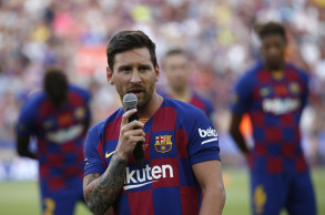 Messi strains calf, will miss Barcelona's US trip