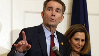 Gov. Northam says he wasn't in racist photo, won't resign
