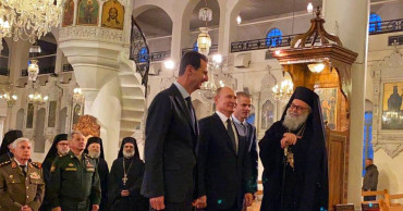 Russia's Putin visits Syria to meet Assad, a key Iran ally