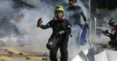 Tear gas, firebombs engulf Hong Kong university in new clash