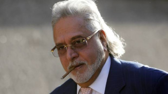 UK official signs order to extradite tycoon Mallya to India