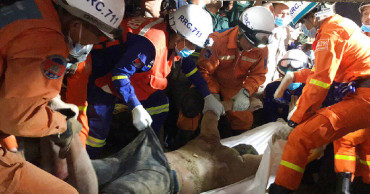 Search in Cambodia resumes after building collapse kills 5