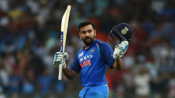 ICC WC: Rohit, Kohli guide India to record total against Pakistan