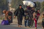 Civilians flee homes in fear of Turkish assault in northern Syria
