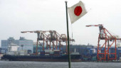 Japan's exports recover but reports trade deficit in October