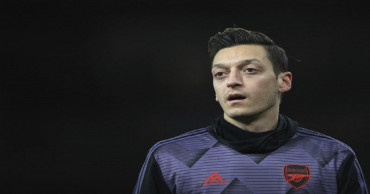 Chinese TV pulls Arsenal game coverage after Ozil criticism