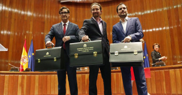 Despite differences, Spain gets its new coalition government