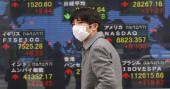 Asian shares mostly lower as US-China deal optimism fades