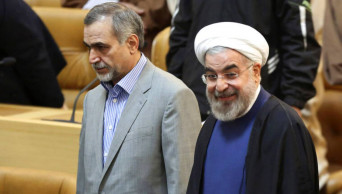 Brother of Iran's president begins prison term