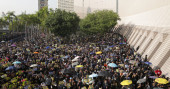 Hong Kong pro-democracy rally cut short by police tear gas