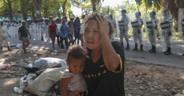 Mexican guardsmen break up migrant caravan along highway