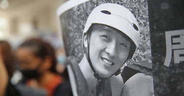 Hong Kong protesters blame police after student dies in fall