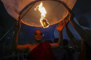 Buddhists celebrate Prabarana Purnima flying lighted balloons