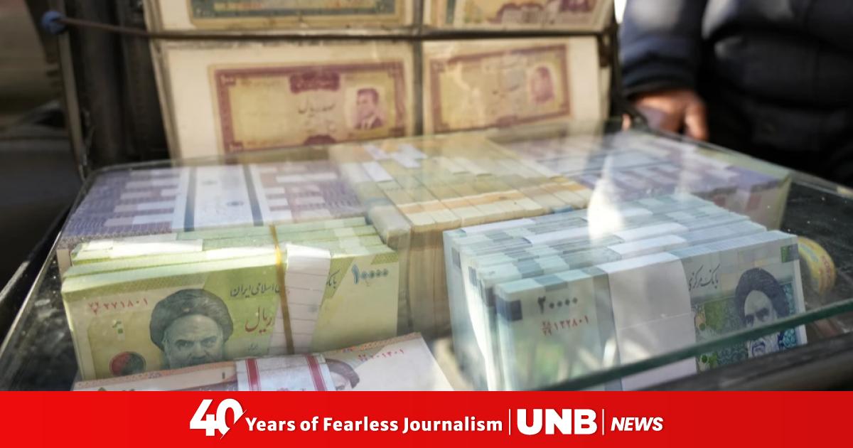 Iran's rial hits a record low, battered by regional tensions and an ...
