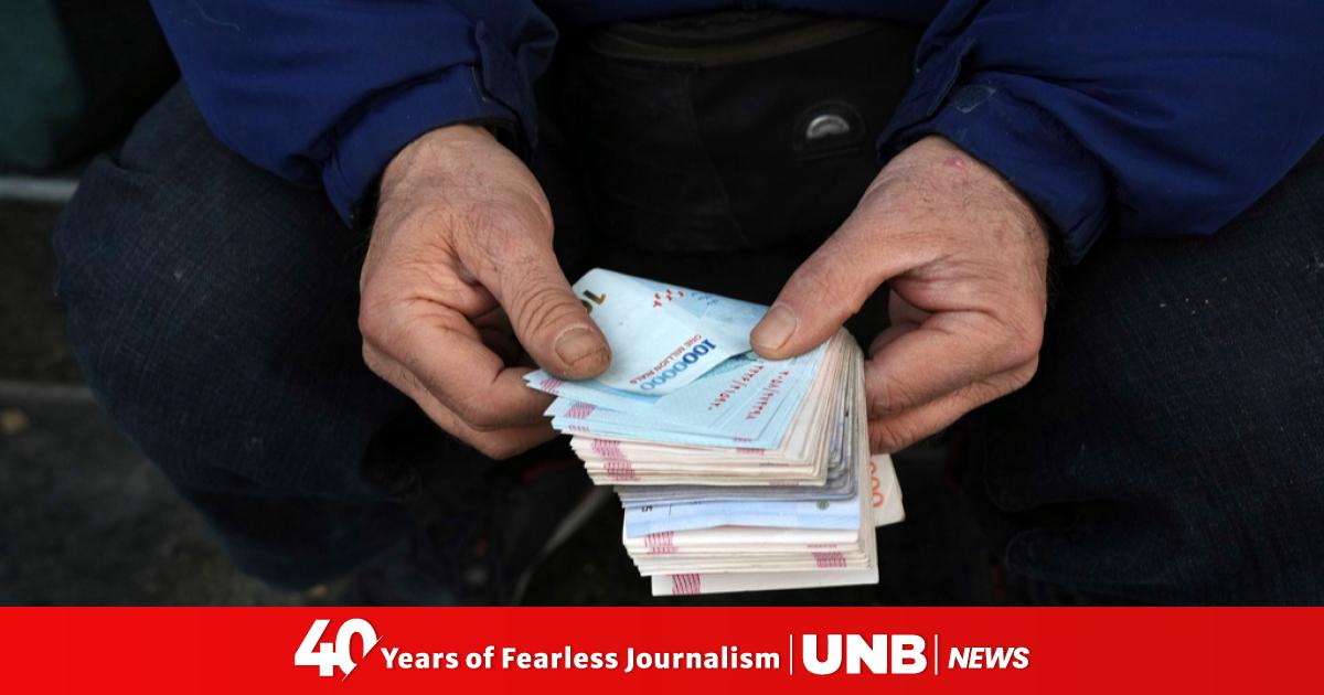 Iran's currency hits record low against dollar amid tensions